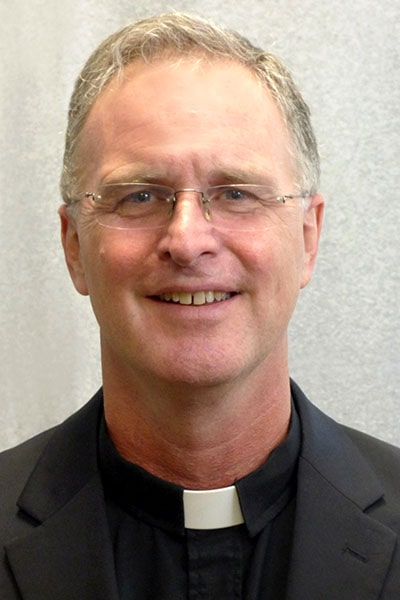 Headshot of Thomas P. Greene, S.J.