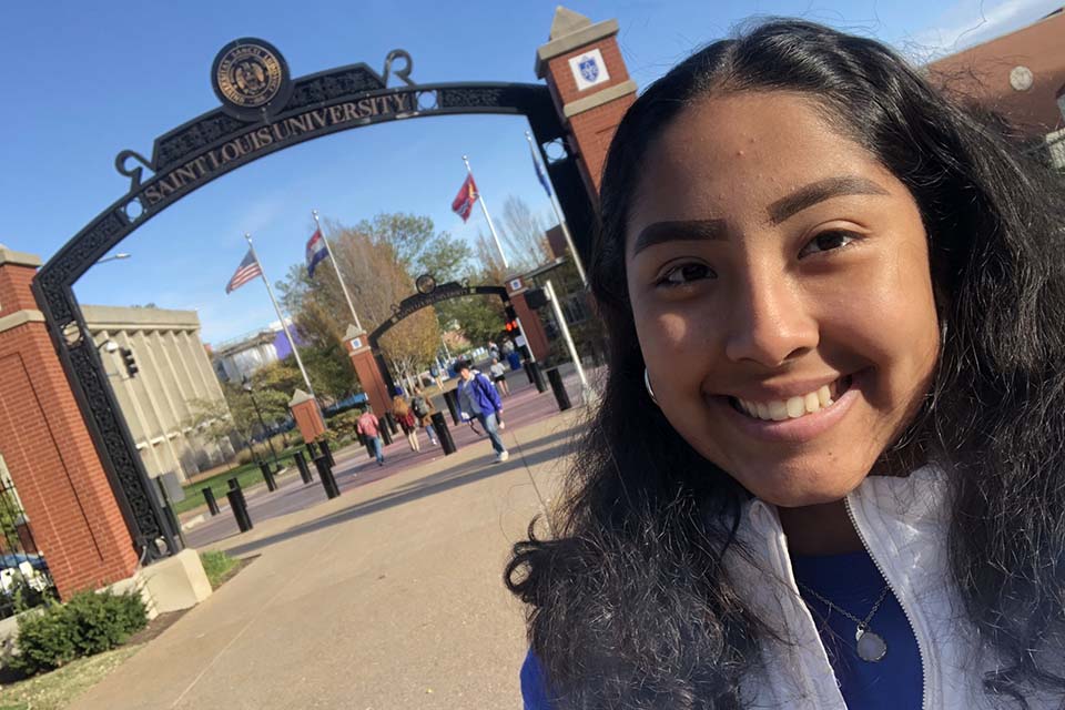 SLU student taking a SLU Gateway Selfie