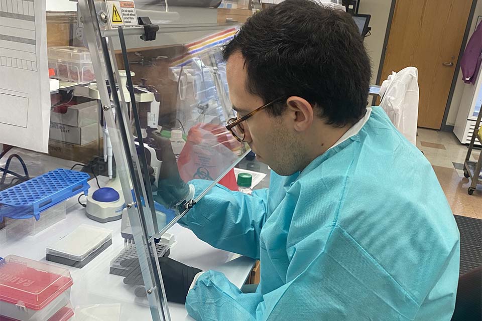 A man works in a lab.