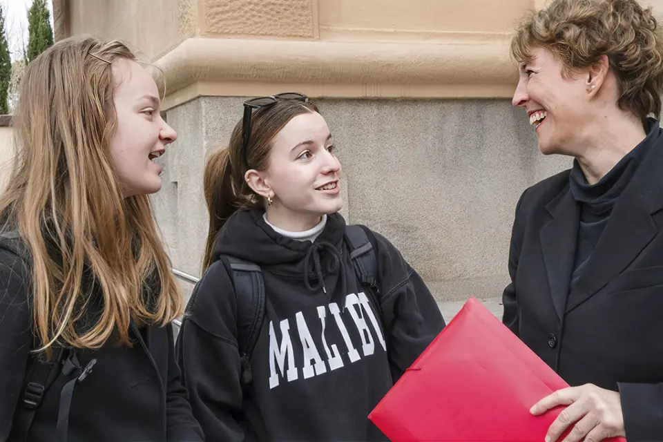 Students with professor Anne McCabe on the SIH rooftop.