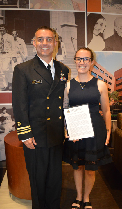 Headshot of Isabelle Carbonne recieving the award